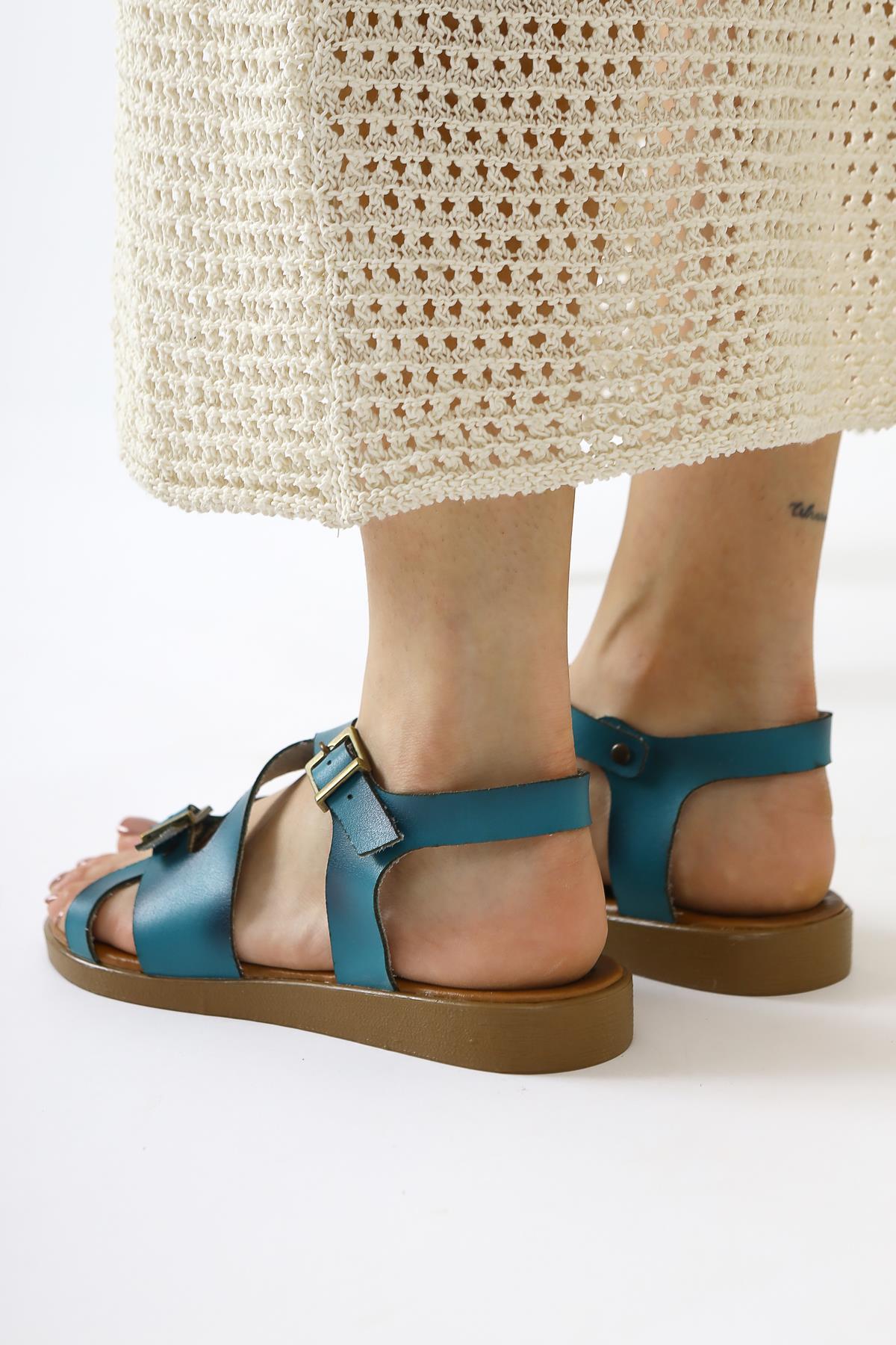 Belize Genuine Leather Turquoise Cross-Strap Sandals