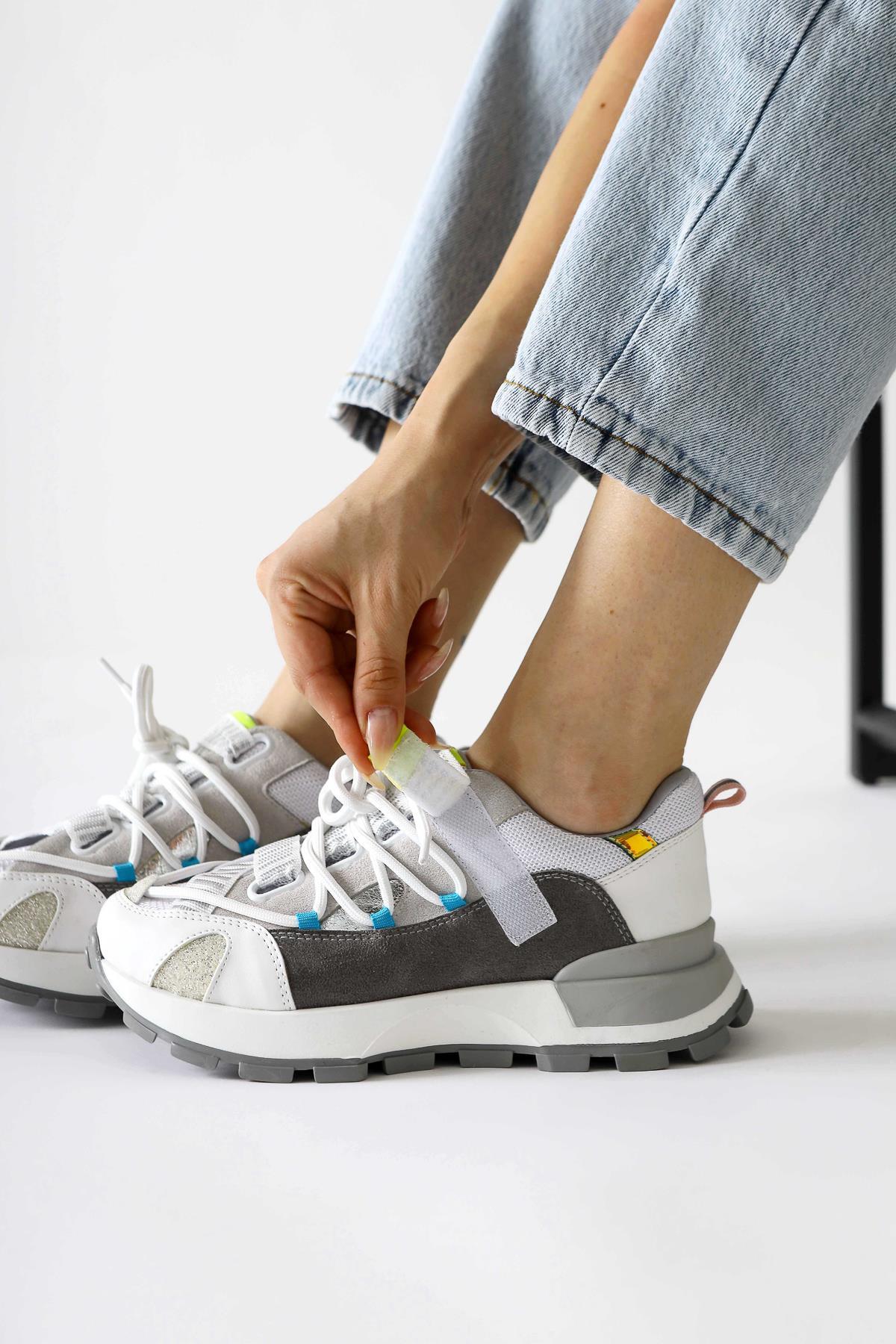 Nely White Asymmetric Lace-Up Sneakers