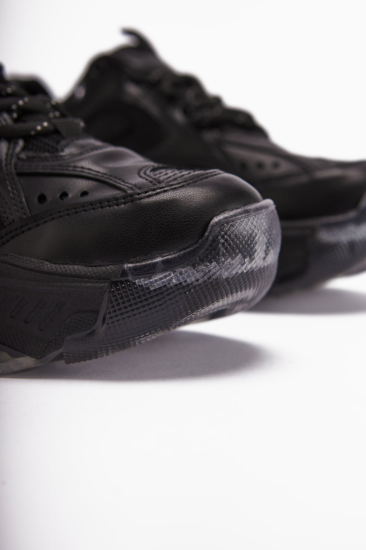 Erla – Black Thick-Sole Lace-Up Sneaker (Women)