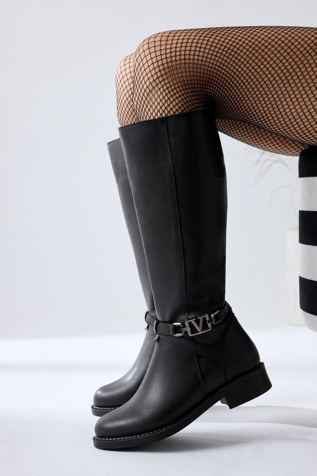 Momena – Black Buckle-Detail Zippered Low-Heel Knee-High Boot (Women)