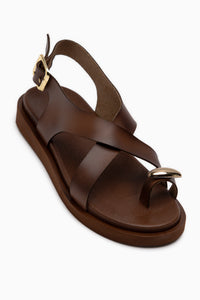 Jolie Tan Buckled Thong Women’s Sandal