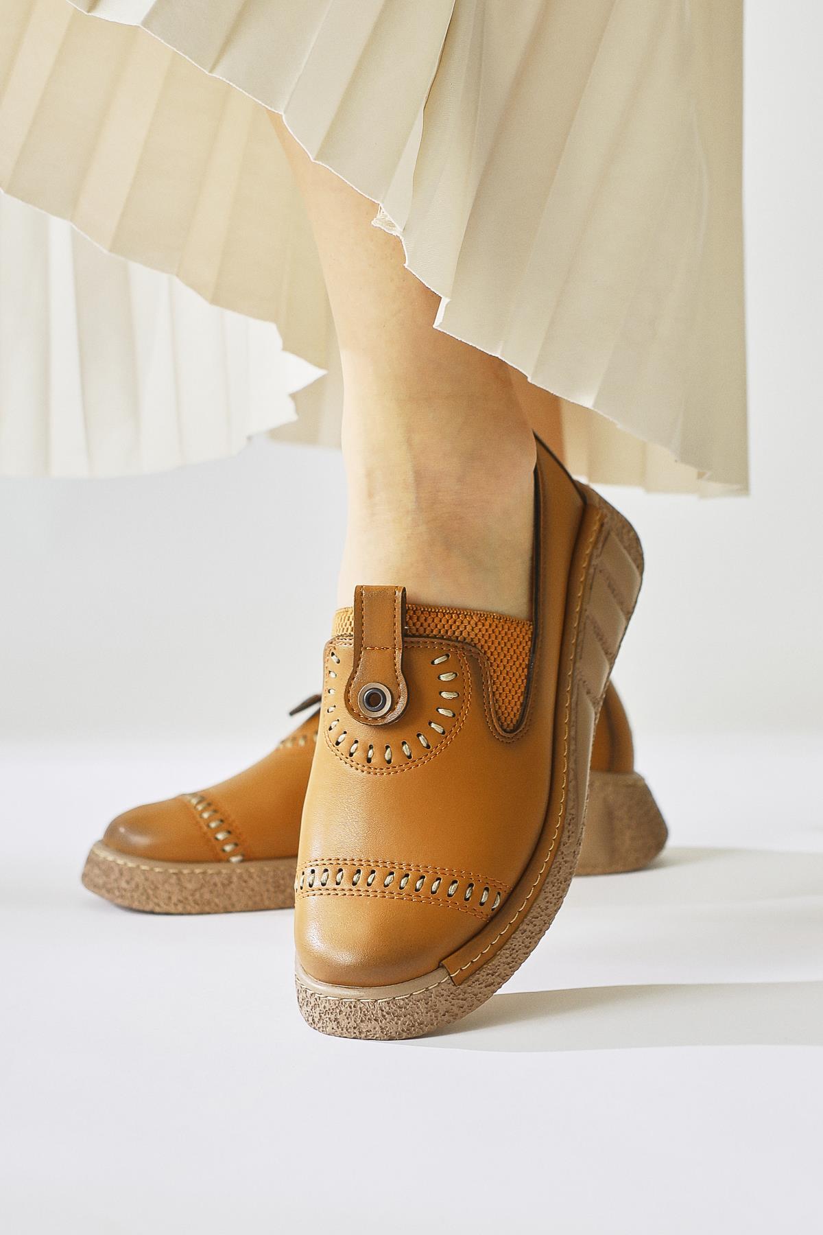 Bethina – Cognac Rivet-Detail Laser-Cut Ballet Flat (Women)