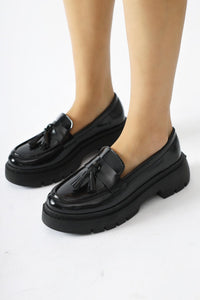 Linni Black Crinkled Patent Leather Tassel Moccasin