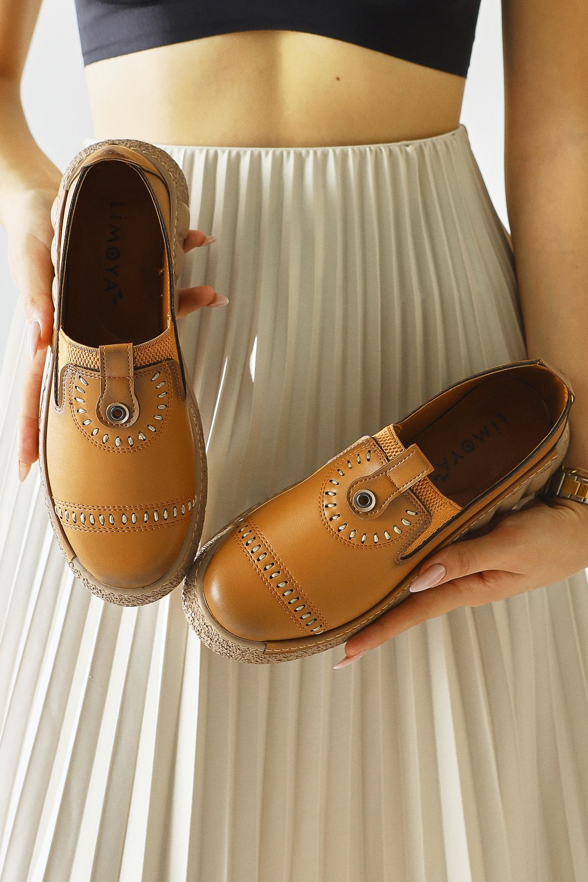 Bethina – Cognac Rivet-Detail Laser-Cut Ballet Flat (Women)