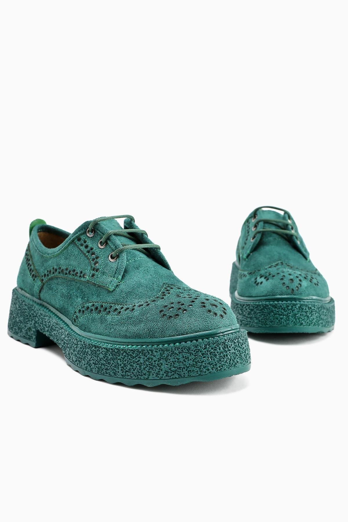 Rossy Green Suede Casual Shoes with Oval Toe and Laser Cut Detail