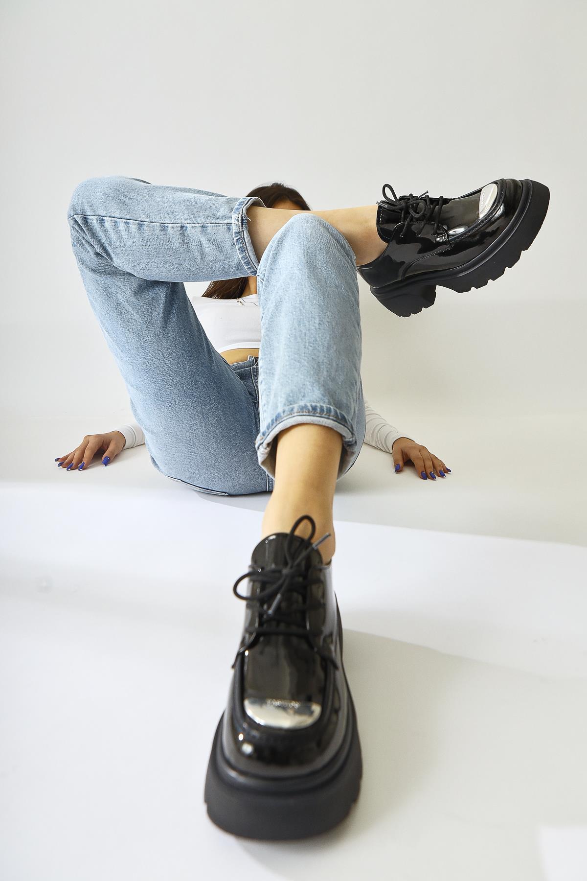 Rod Black Patent Leather Moccasin with Metallic Toe