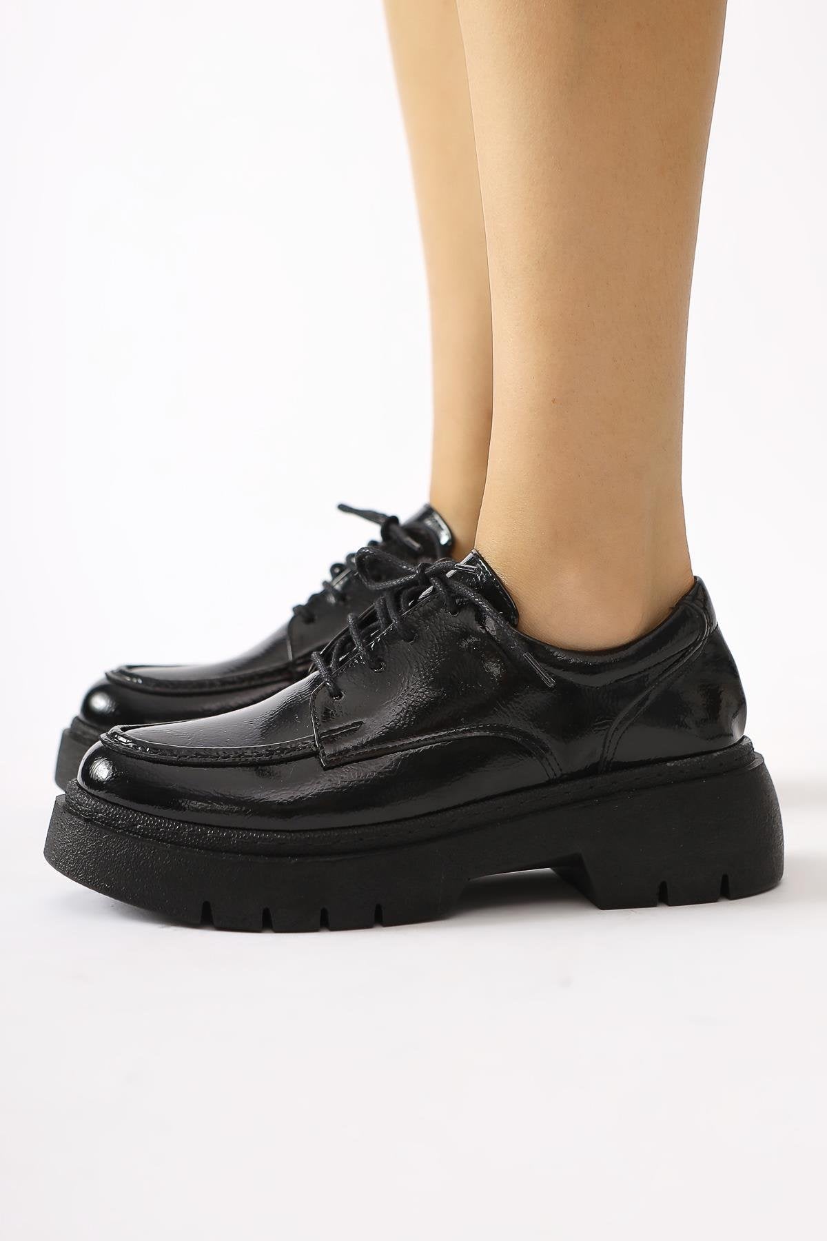 Callie Black Crinkled Patent Leather Lace-Up Moccasin