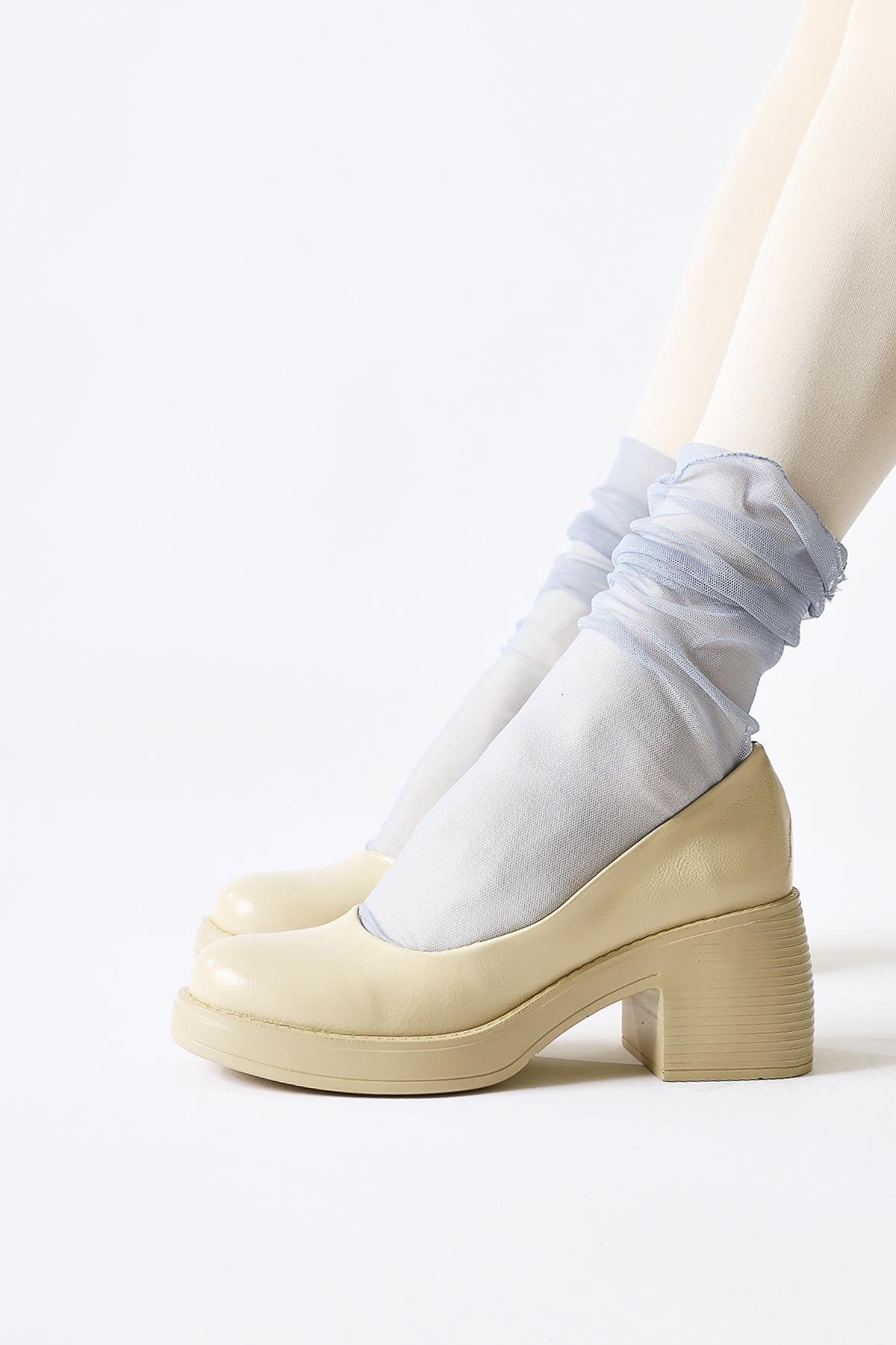 Jeannie Beige Patent Leather Oval Toe Heeled Daily Shoe