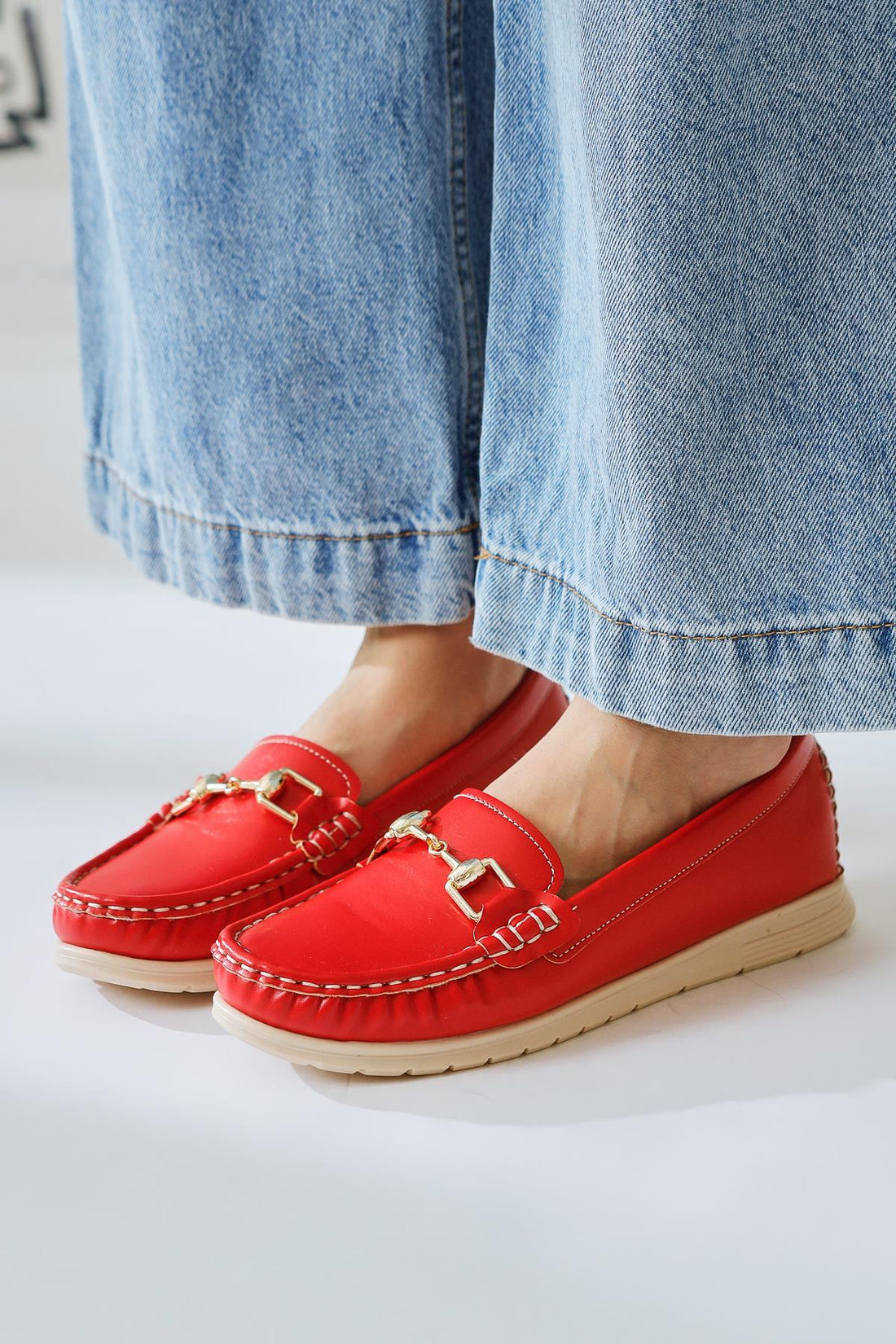 Tola – Red Buckle-Detail Casual Shoe (Women)