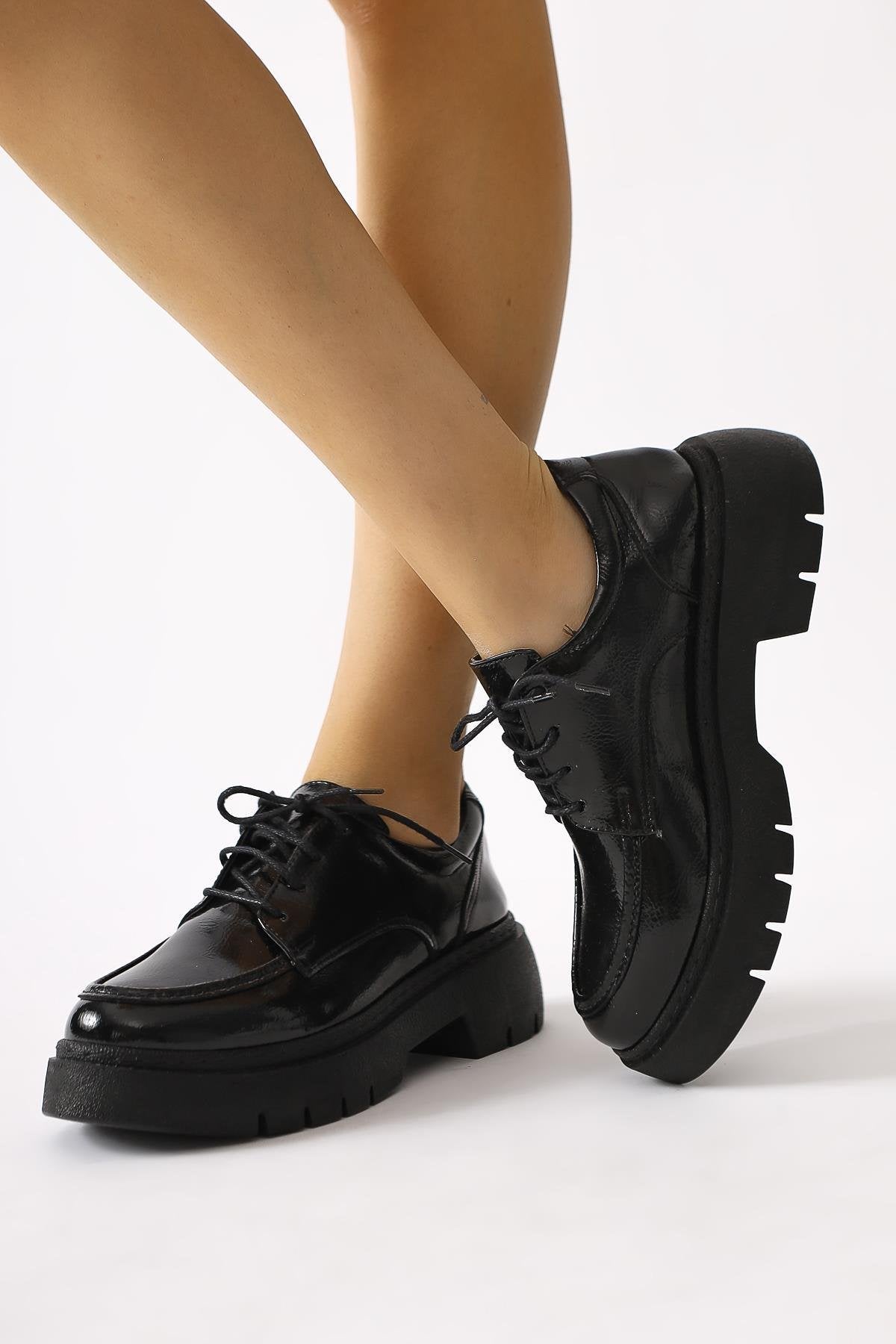 Callie Black Crinkled Patent Leather Lace-Up Moccasin