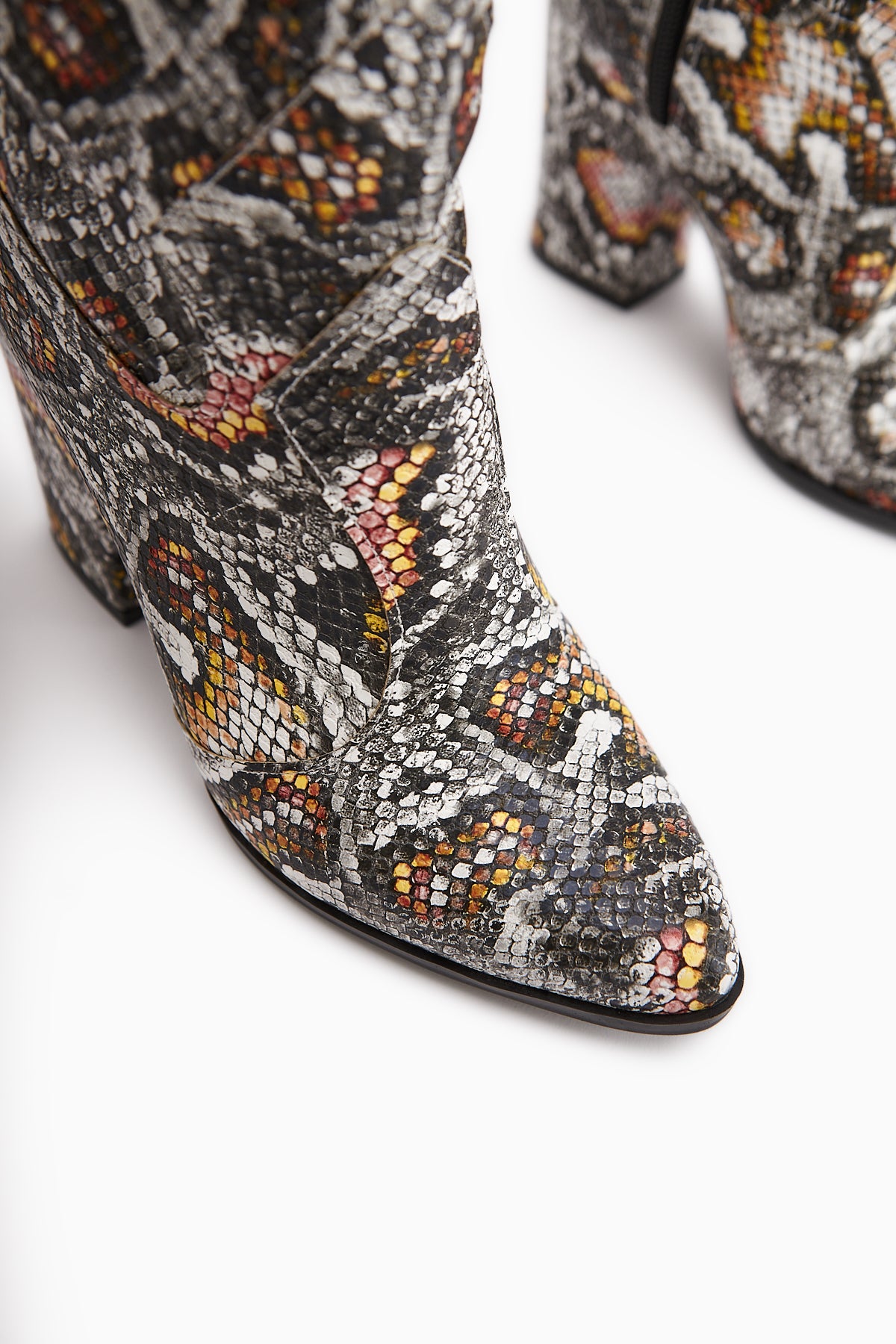 Keri Snake Print Asymmetrical Cut Women’s Short Heeled Boots