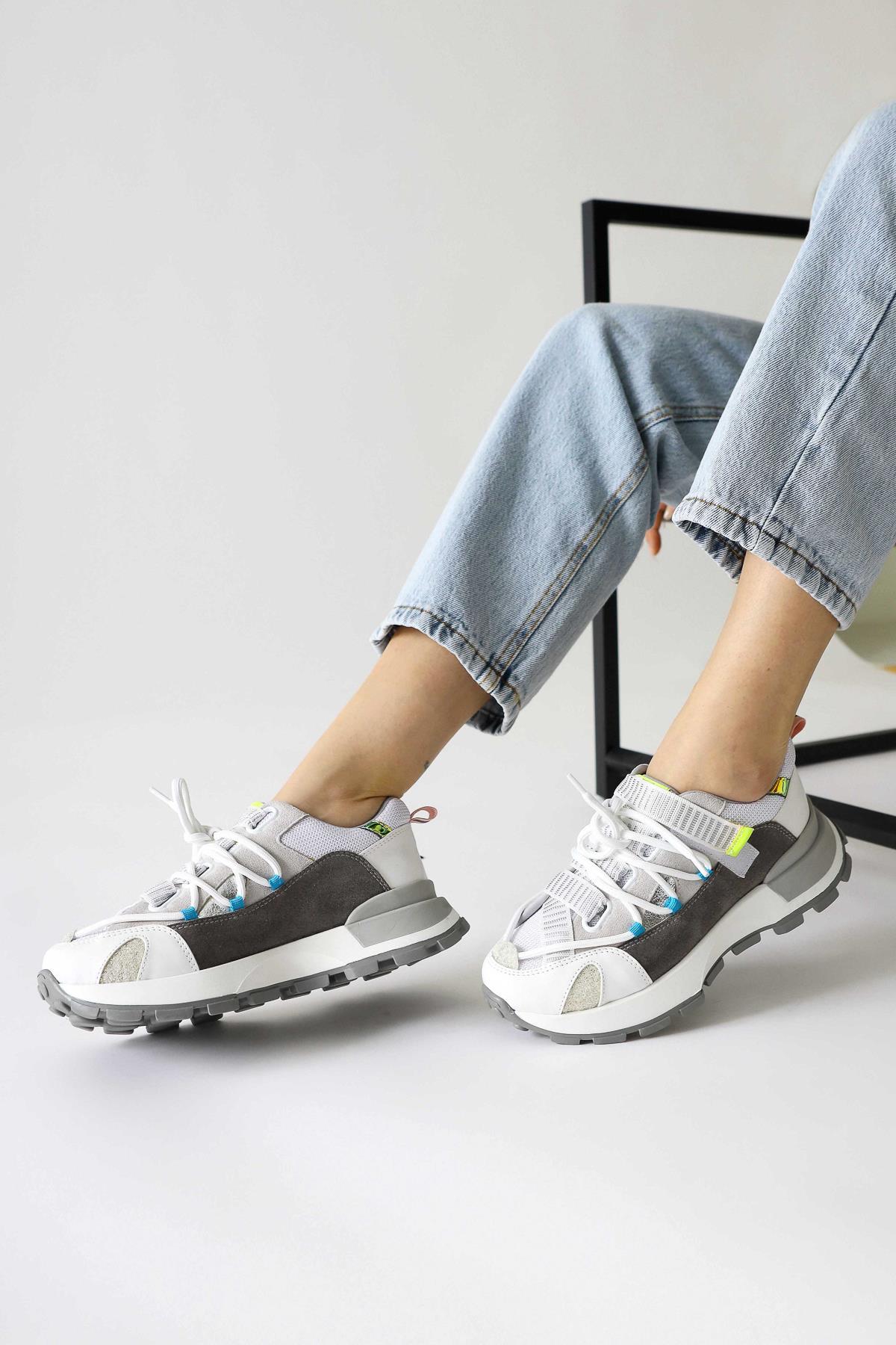 Nely White Asymmetric Lace-Up Sneakers