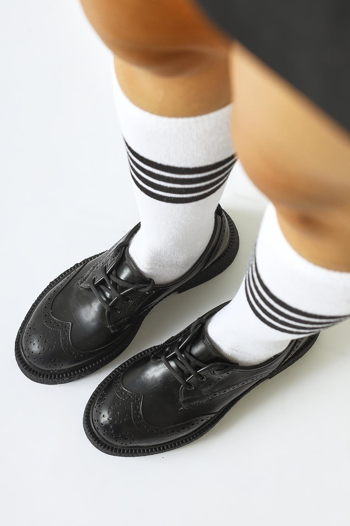 Rossy Black Everyday Shoes with Oval Toe and Laser Cut Detail