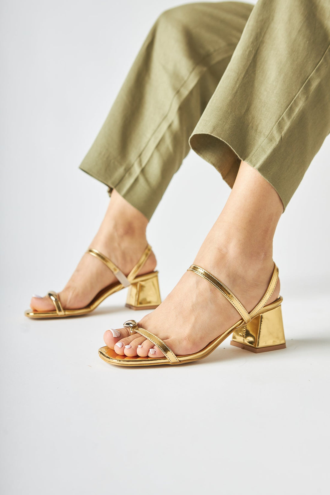 Selenya Gold Thong Sandals with Buckle Detail for Women