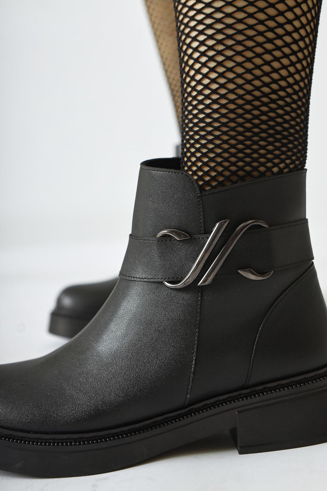 Birta – Black Buckle-Detail Oval-Toe Boot (Women)