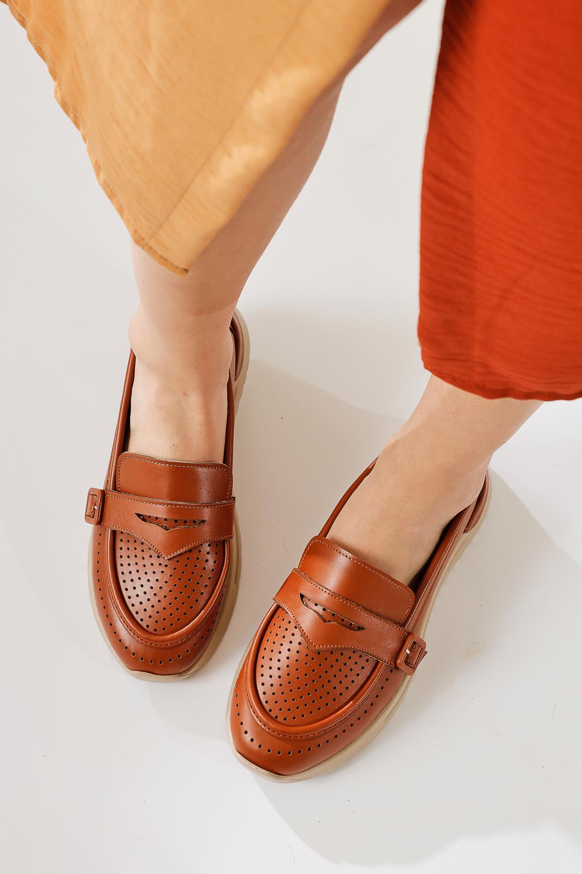 Zain – Cognac Laser-Cut Buckle-Detail Ballet Flat (Women)