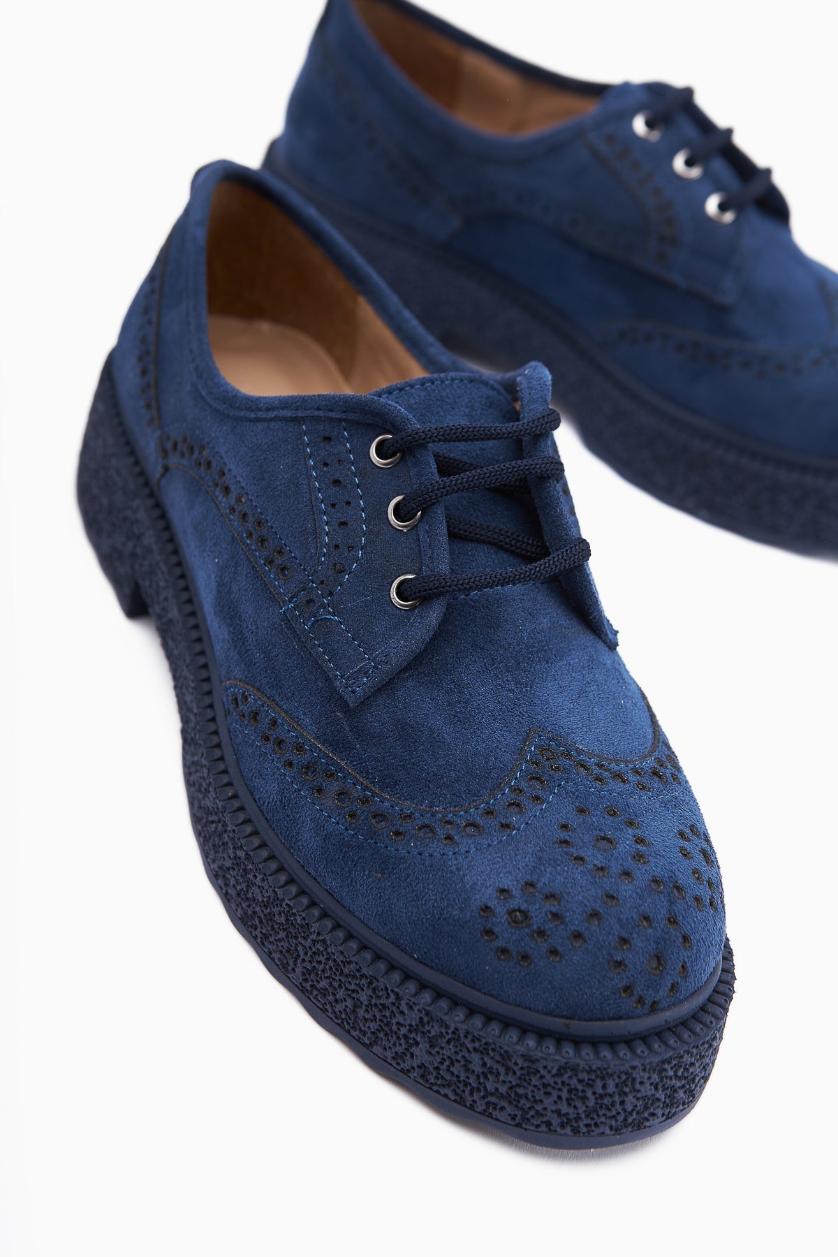 Rossy – Navy Suede Laser-Cut Oval-Toe Shoe (Women)