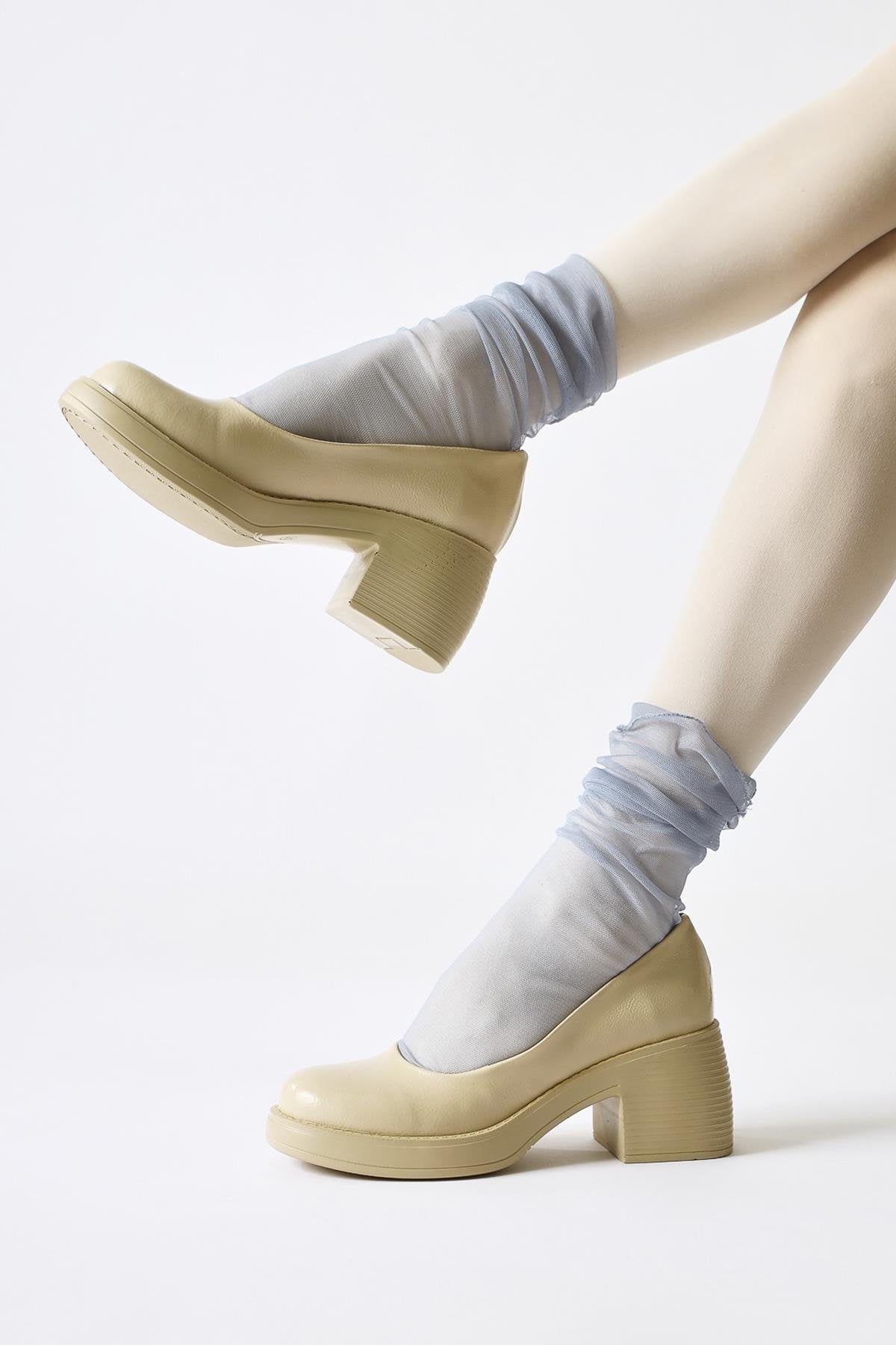 Jeannie Beige Patent Leather Oval Toe Heeled Daily Shoe