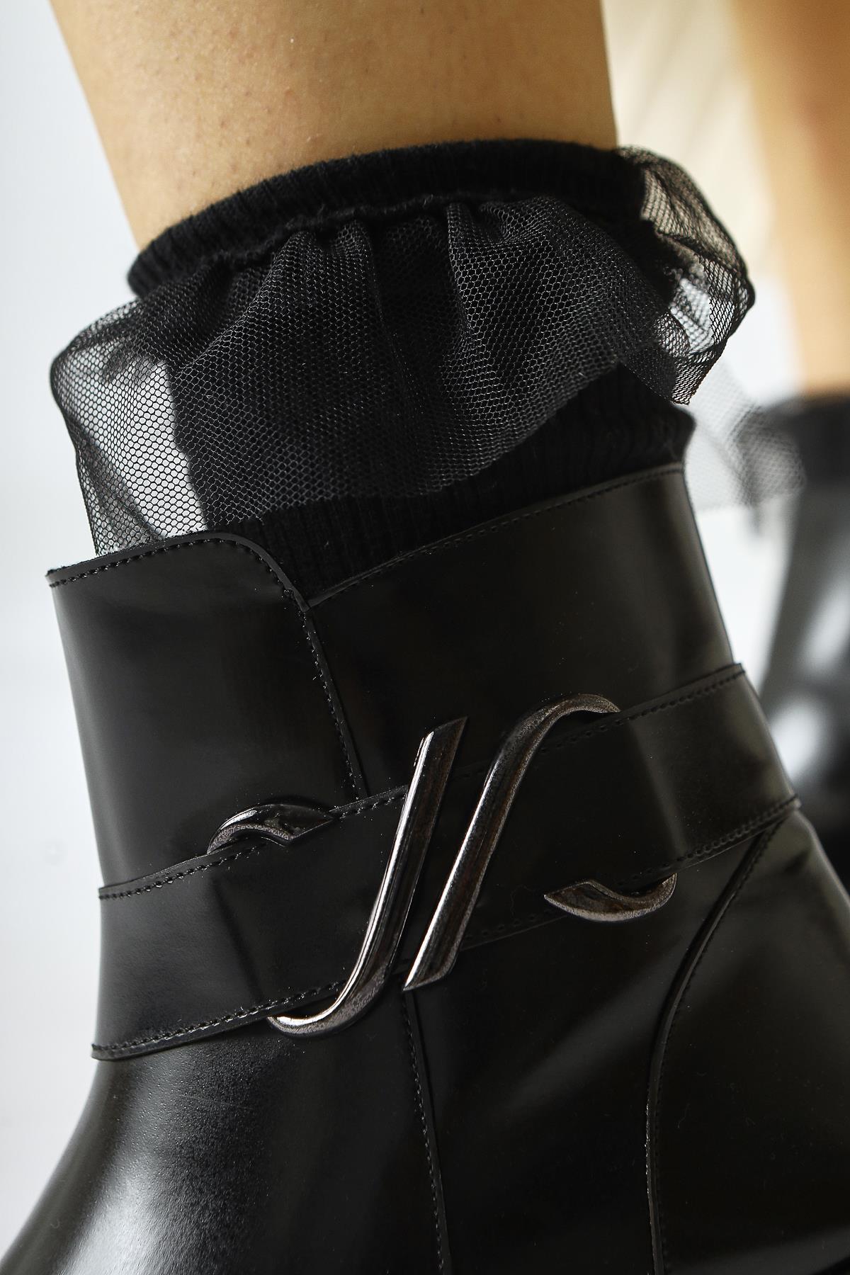 Birta – Black Patent Buckle-Detail Oval-Toe Boot (Women)
