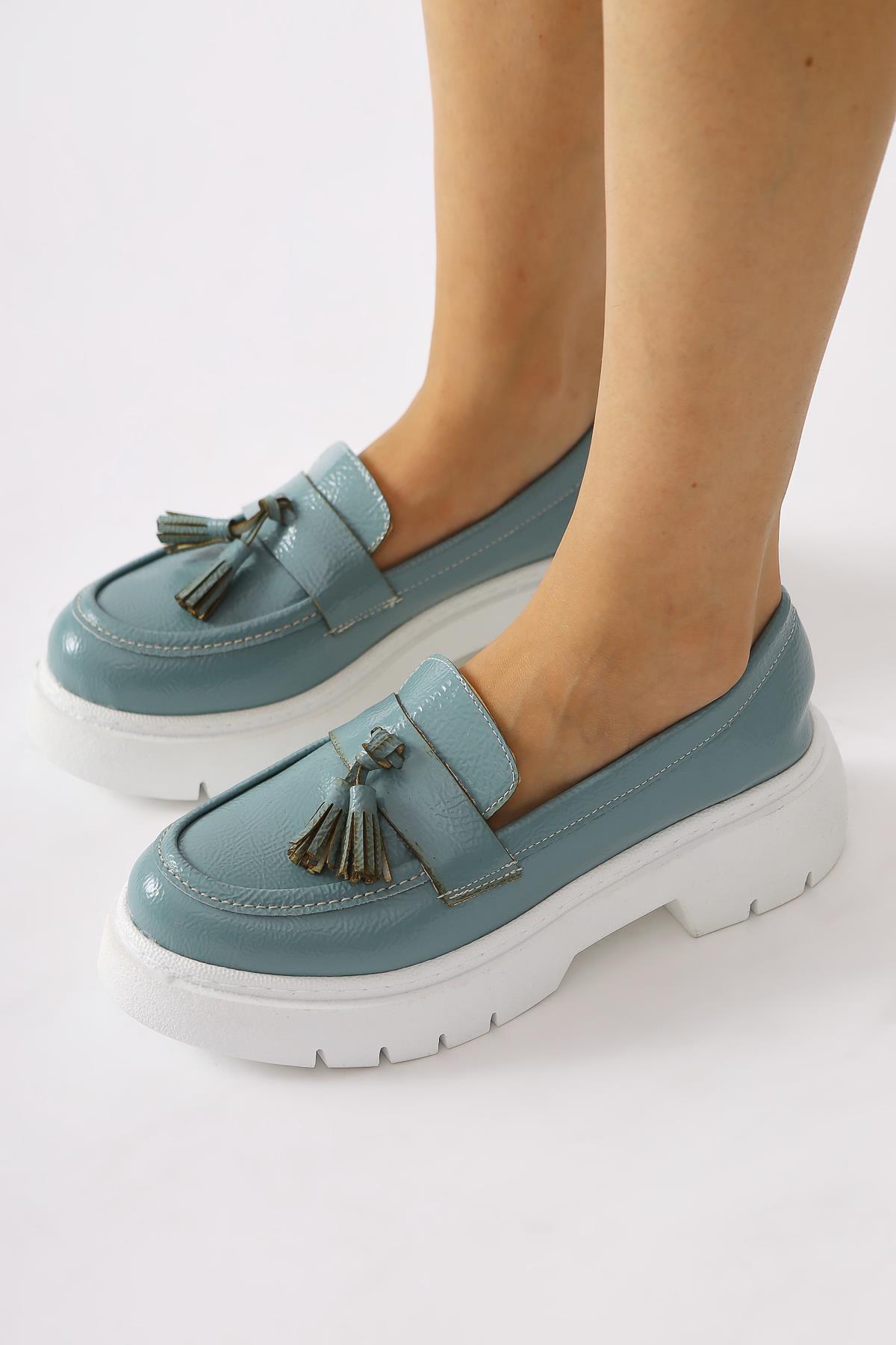 Linni Turquoise Crinkled Patent Leather Moccasins with Tassels