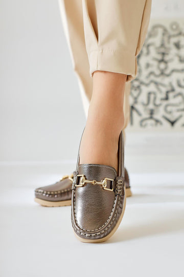 Tola – Platinum Buckle-Detail Shoe (Women)