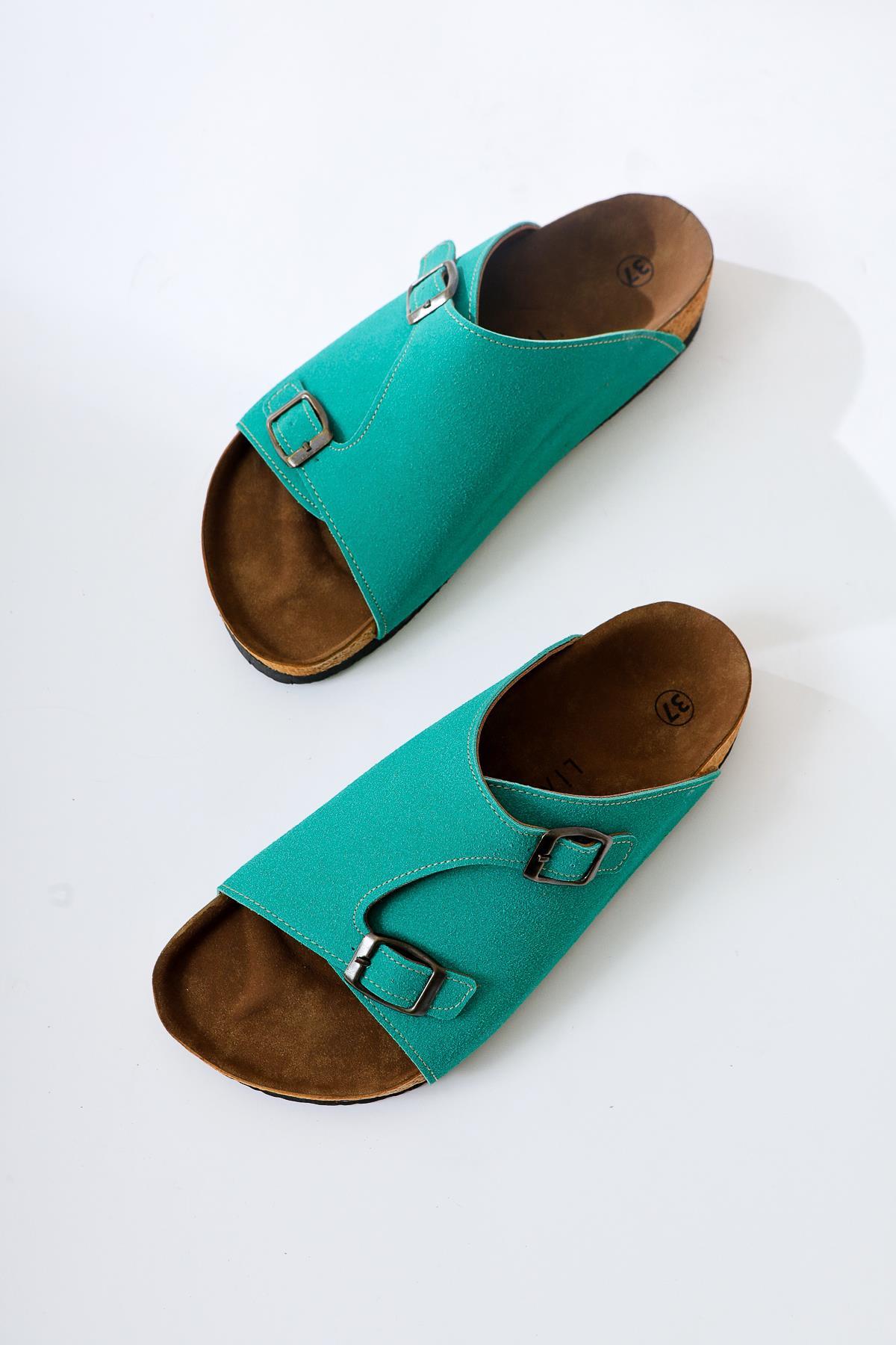 Christella Green Suede Slide with Double Buckle Detail