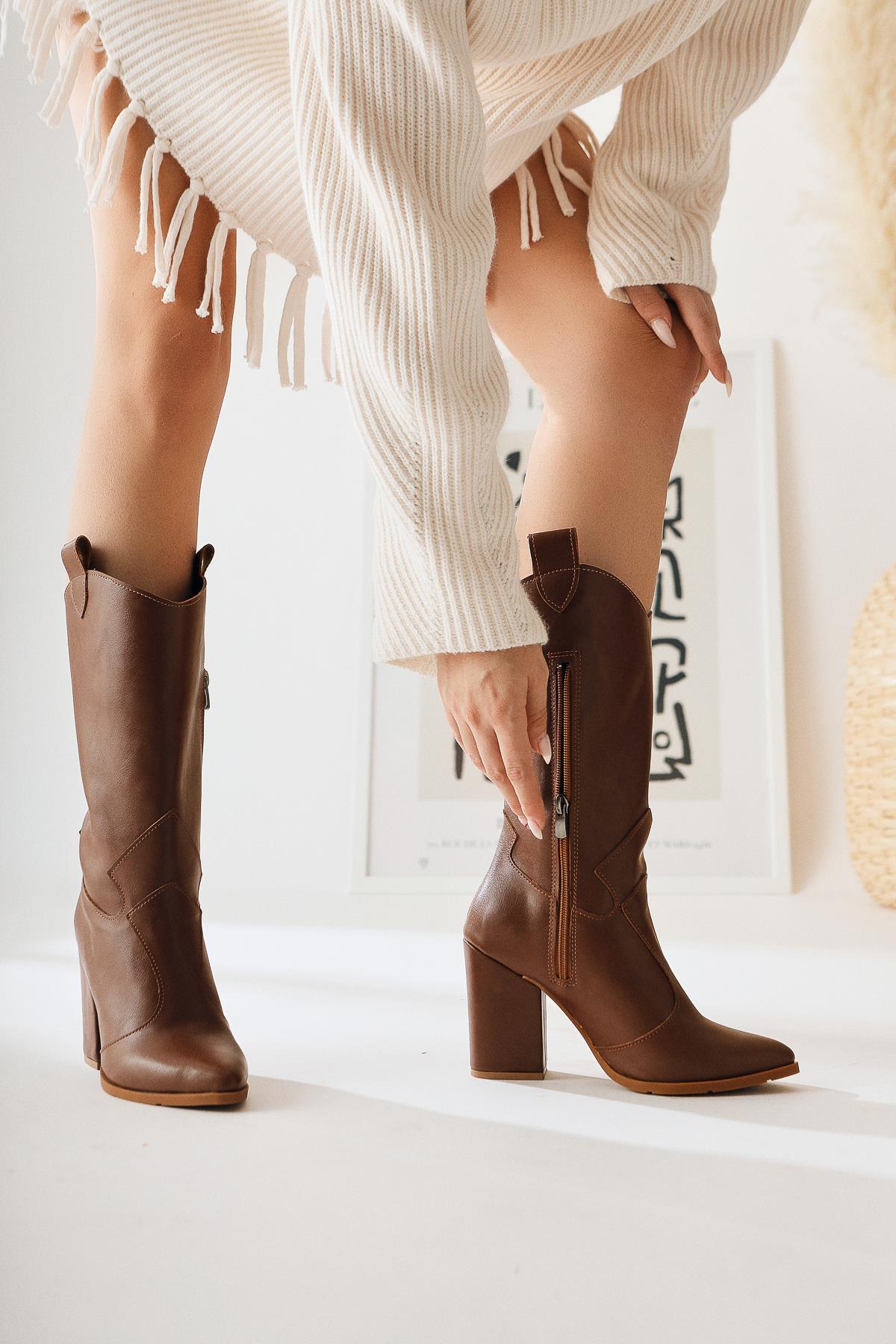 Keri Taba Asymmetric Cut Heeled Ankle Boot