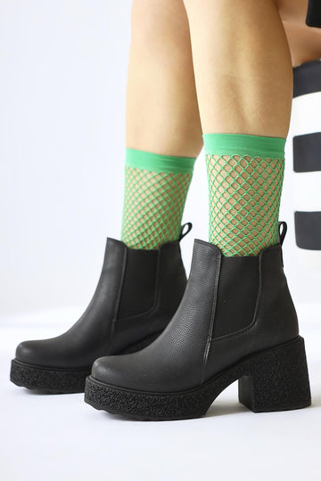 Thida – Black Elasticized Platform-Sole Pull-On Boot (Women)