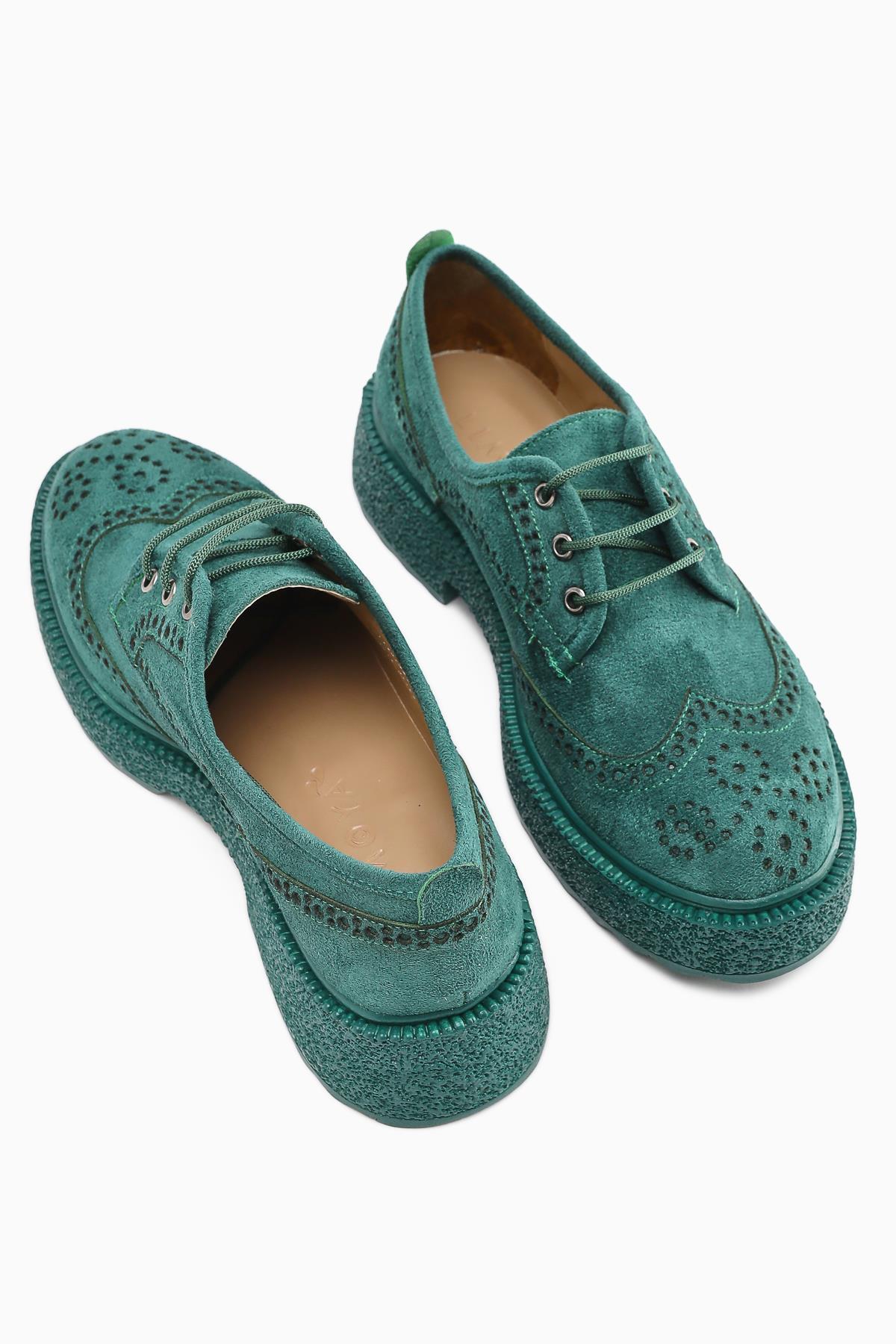 Rossy Green Suede Casual Shoes with Oval Toe and Laser Cut Detail
