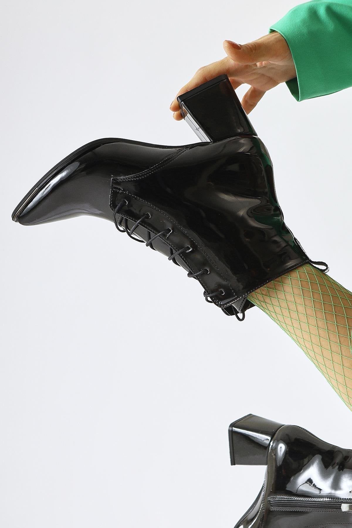 Kalaya – Black Patent Pointed-Toe Zippered Heeled Boot (Women)