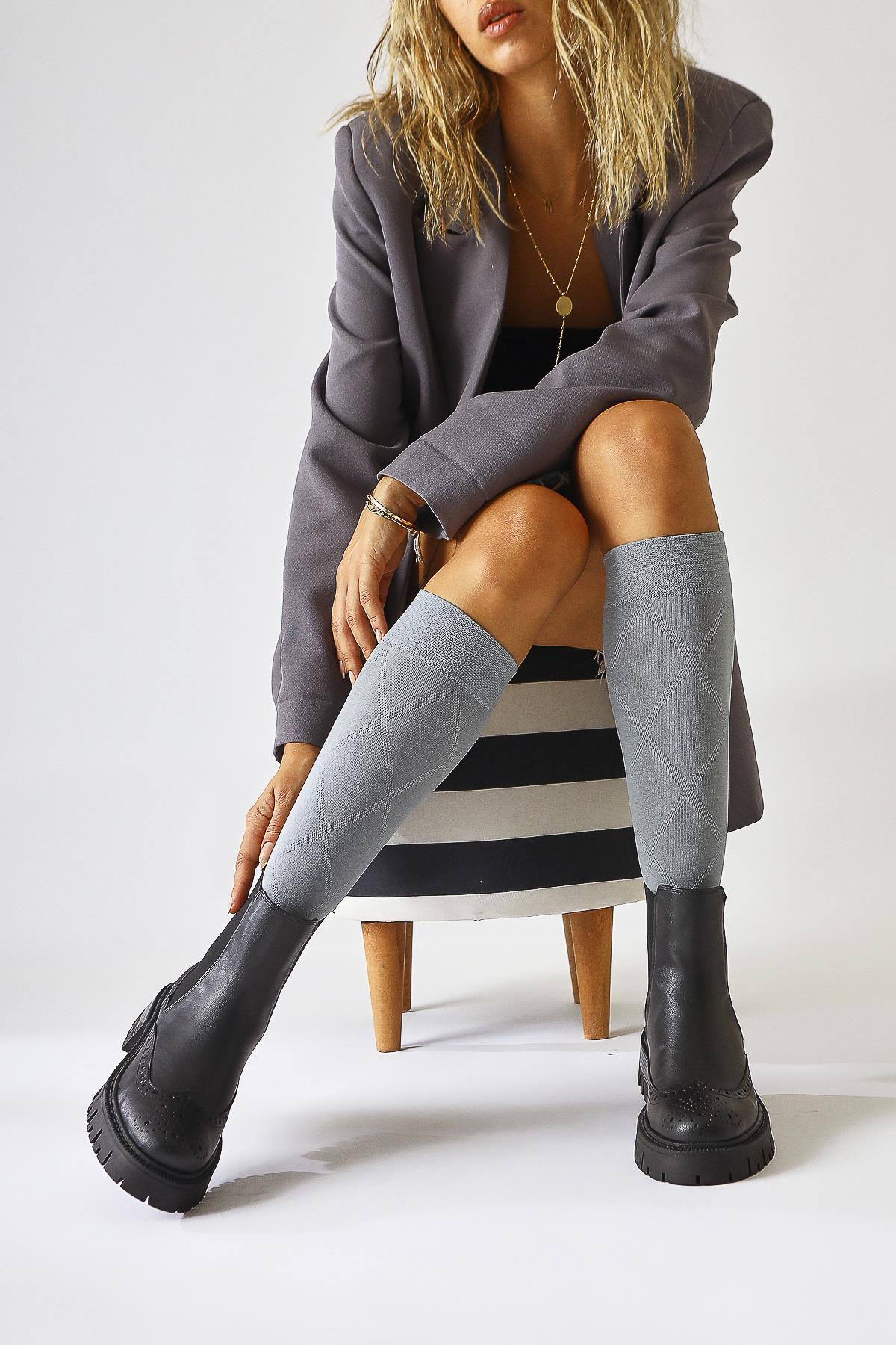 Leyah – Black Laser-Cut Detail Elastic Boot