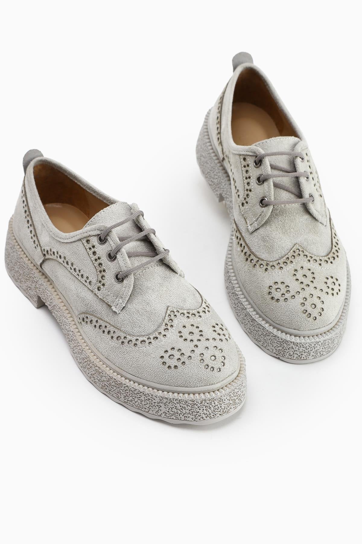 Rossy Ice Suede Oval Toe Laser Cut Everyday Women's Shoe