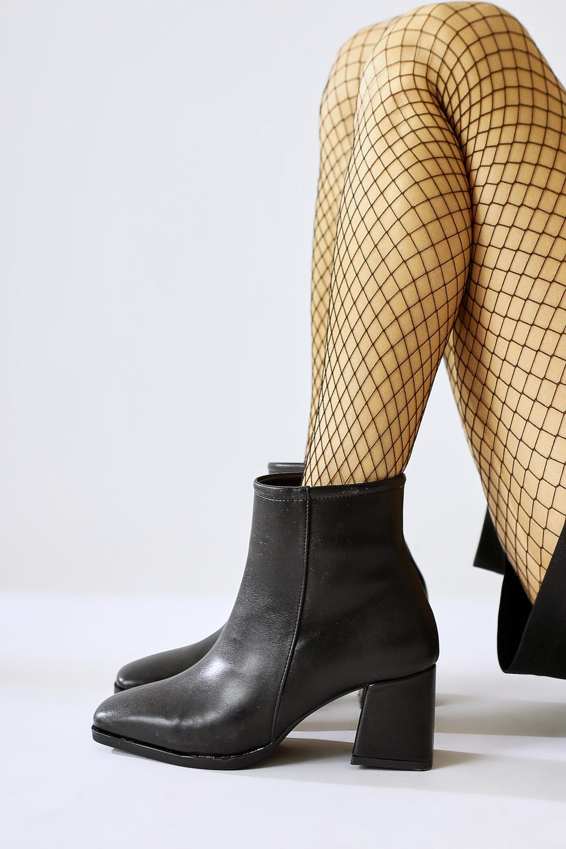 Ream – Black Pointed-Toe Heeled Boot (Women)