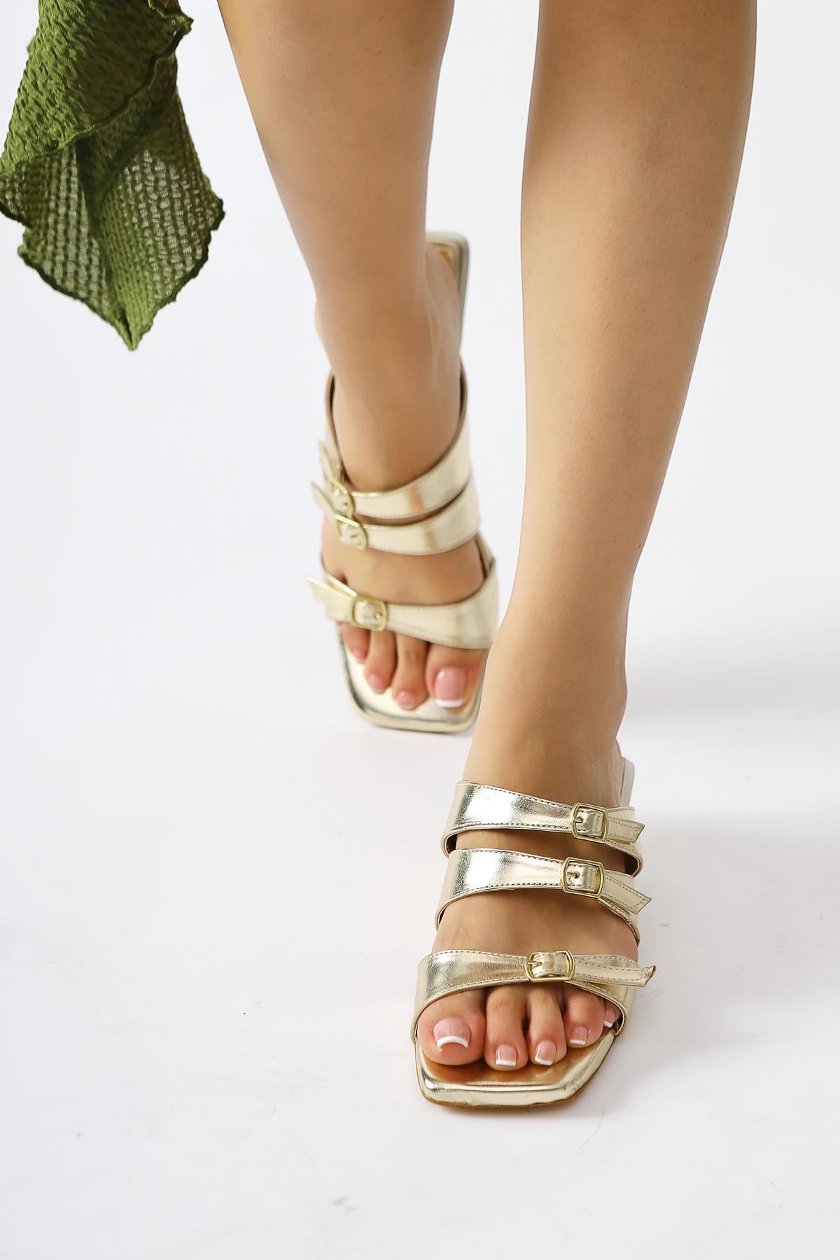 Mellanie Gold Patent Leather Triple Strap Low Heel Slides