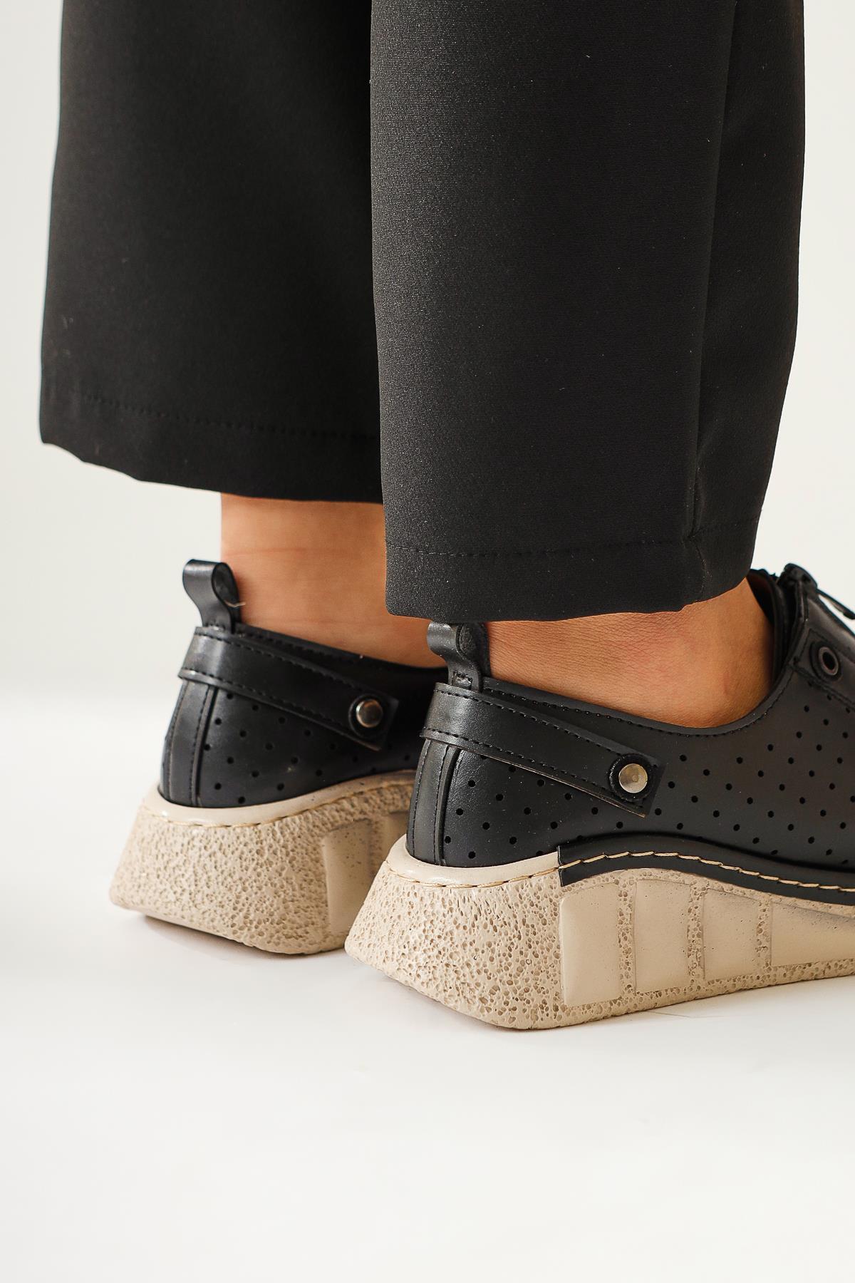 Melonie – Black Laser-Cut Zippered Everyday Shoe
