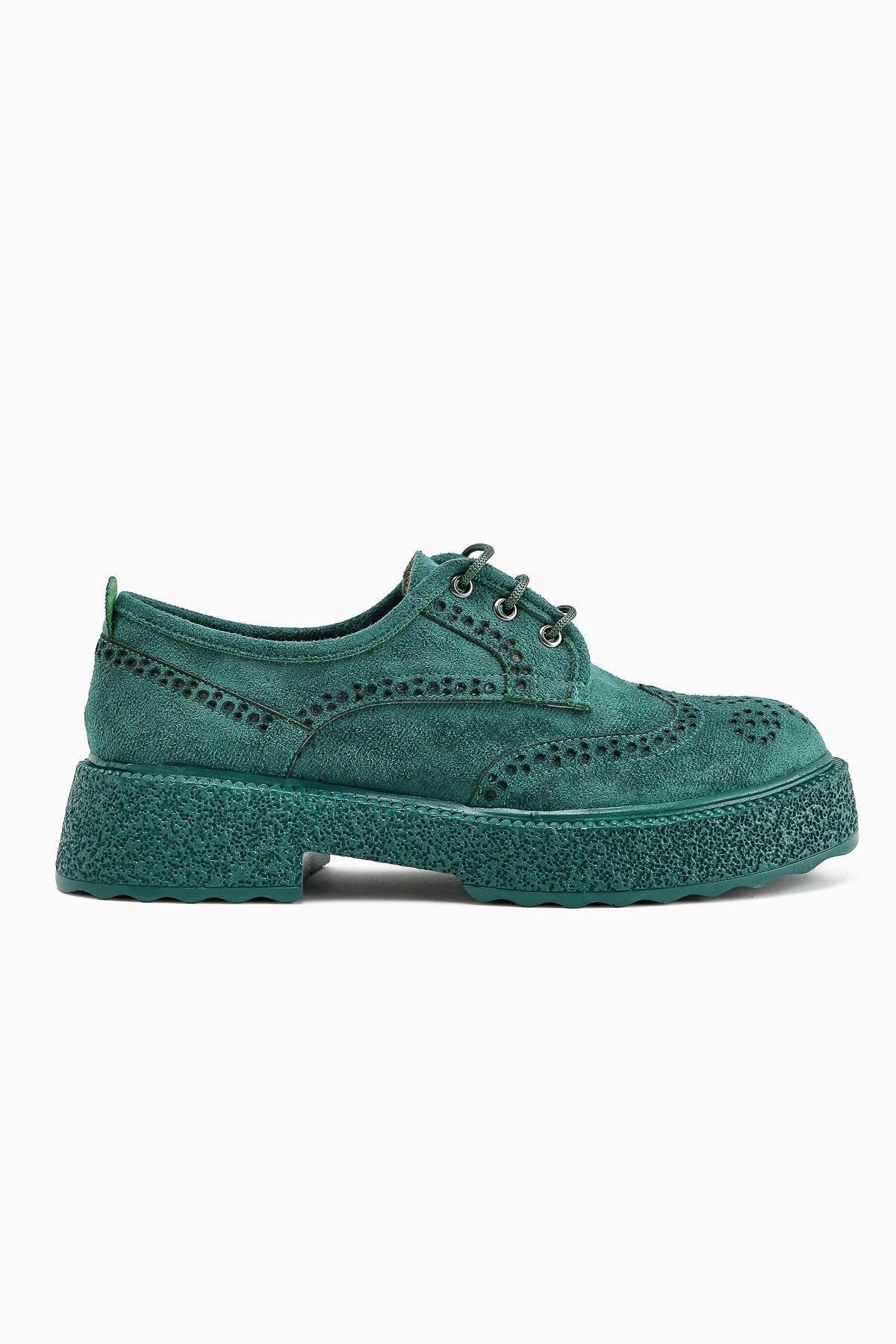 Rossy Green Suede Casual Shoes with Oval Toe and Laser Cut Detail