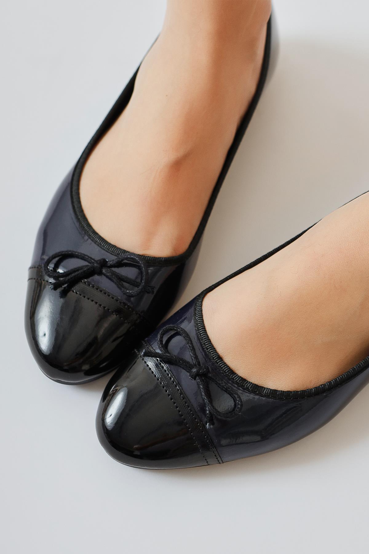 Sobhie Navy Patent Leather Flat with Black Toe and Bow Detail