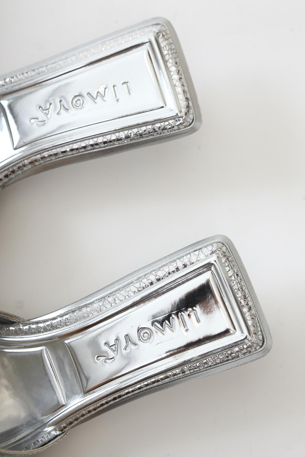 Juvy Glossy Silver Snake Skin Textured Bow Slippers