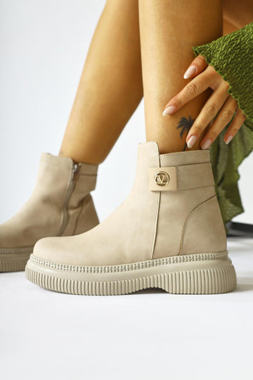 Caiza – Cream Buckle-Detail Round-Toe Ankle Boot (Women)