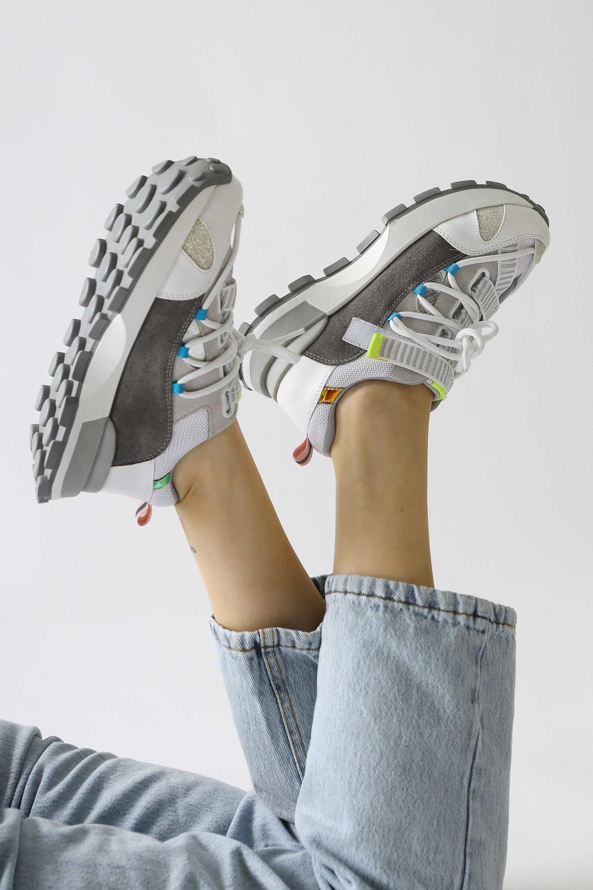 Nely White Asymmetric Lace-Up Sneakers