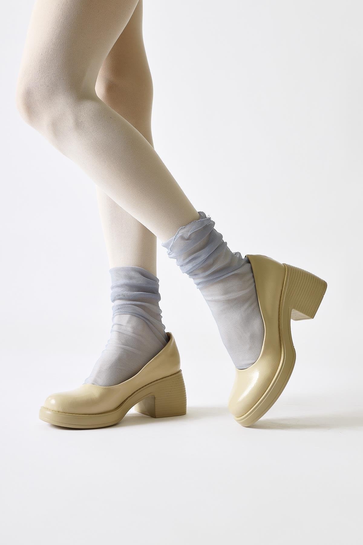 Jeannie Beige Patent Leather Oval Toe Heeled Daily Shoe