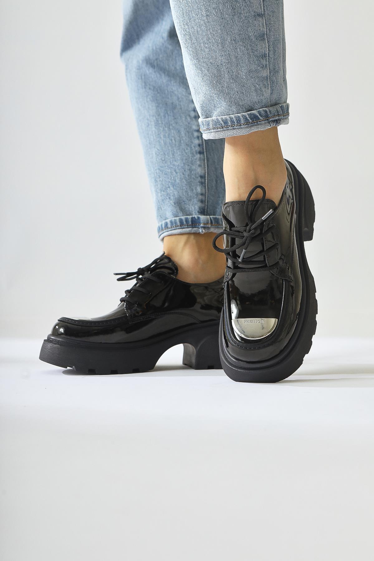 Rod Black Patent Leather Moccasin with Metallic Toe