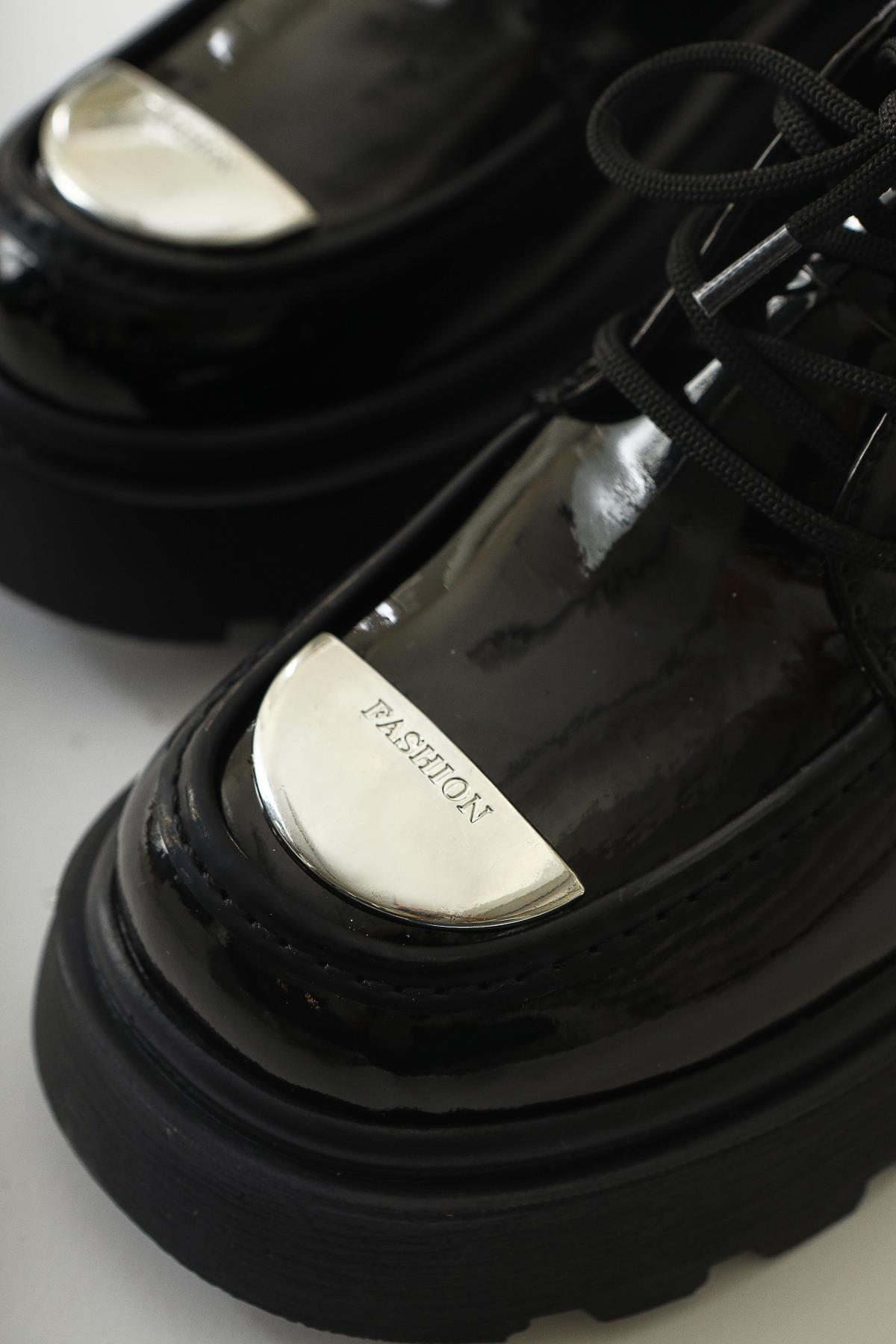 Rod Black Patent Leather Moccasin with Metallic Toe