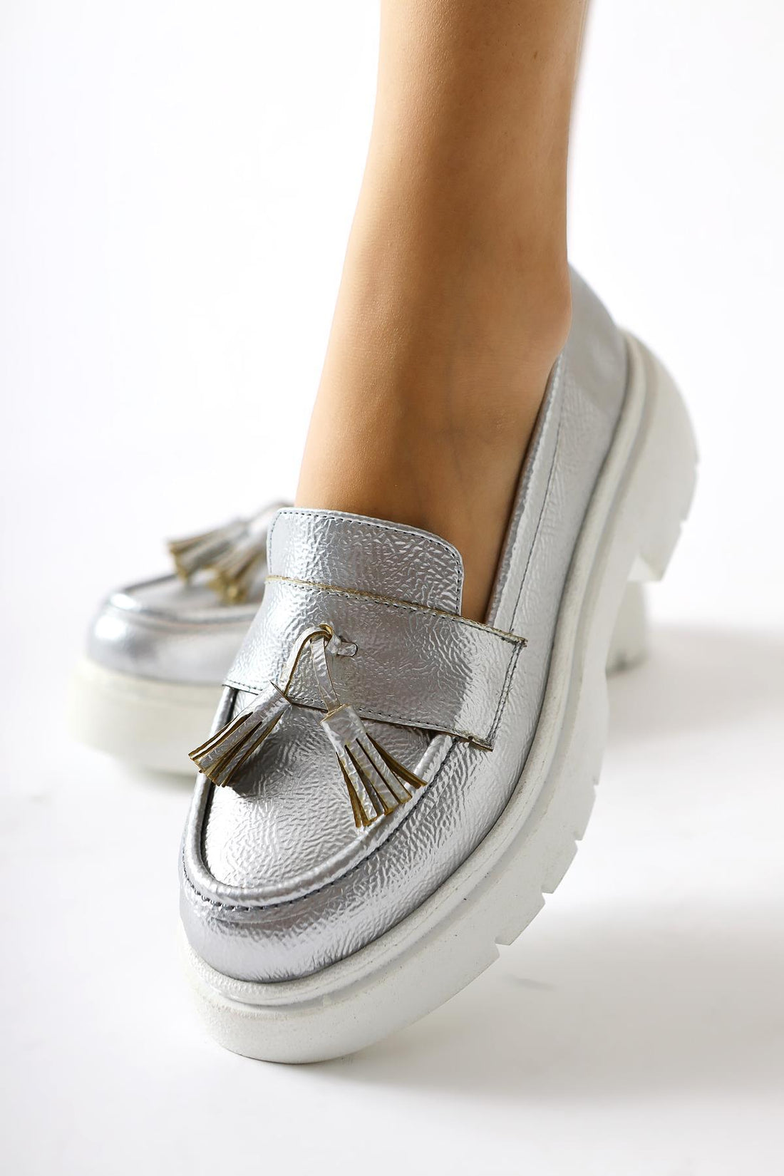 Linni Silver Crinkled Patent Leather Moccasins with Tassels