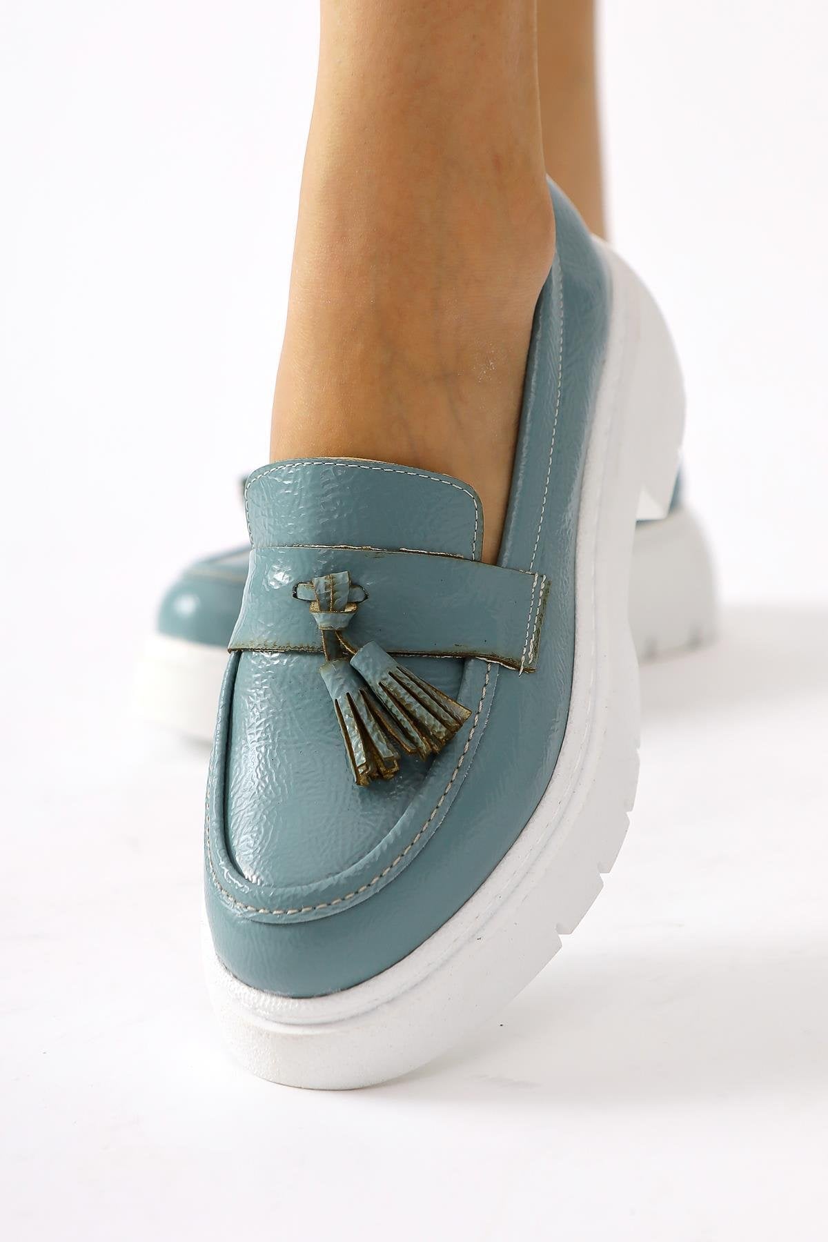 Linni Turquoise Crinkled Patent Leather Moccasins with Tassels