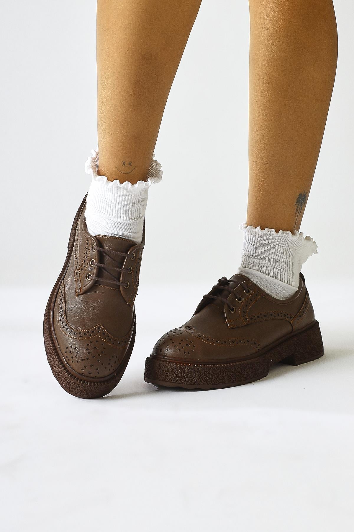 Rossy Mink Suede Oval-Toed Laser Cut Casual Shoes