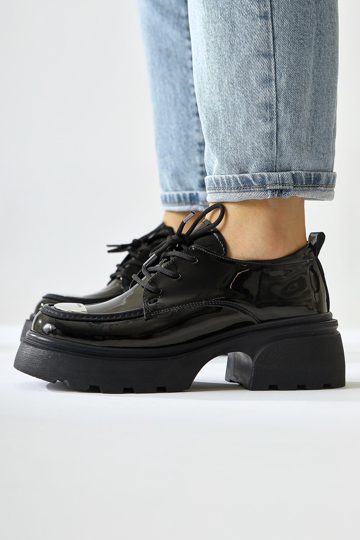 Rod Black Patent Leather Moccasin with Metallic Toe